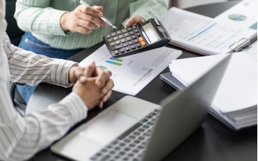 Two CPA professionals performing financial analysis for bookkeeping services in Billings, Montana