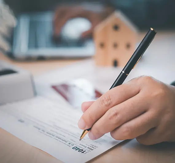 CPA professional completing a tax preparation form for a Small Business with Business Tax Preparation Services in Billings